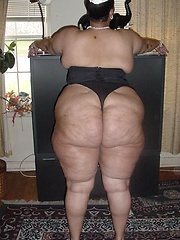 Very big black mama shows her fat ass