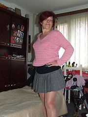 Naughty mature Rosie is showing off her stuff