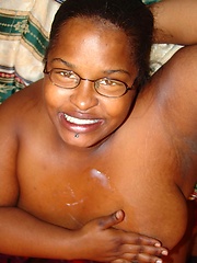 Black fatty in glasses has her pussy stuffed by two hung guys