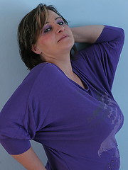 Fat mature touching her round boobs