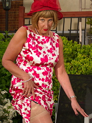 Horny British mature lady playing in the garden