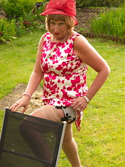 Horny British mature lady playing in the garden
