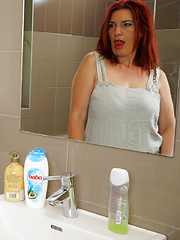 Horny housewife masturbating in her bathroom