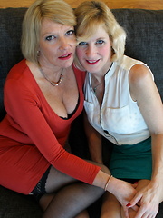 Two British housewives play with each other